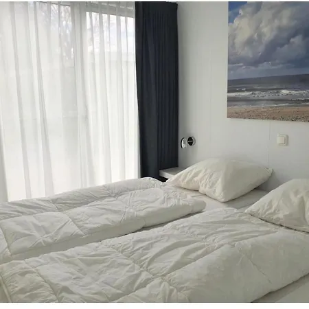 Knus chalet Heidebloem